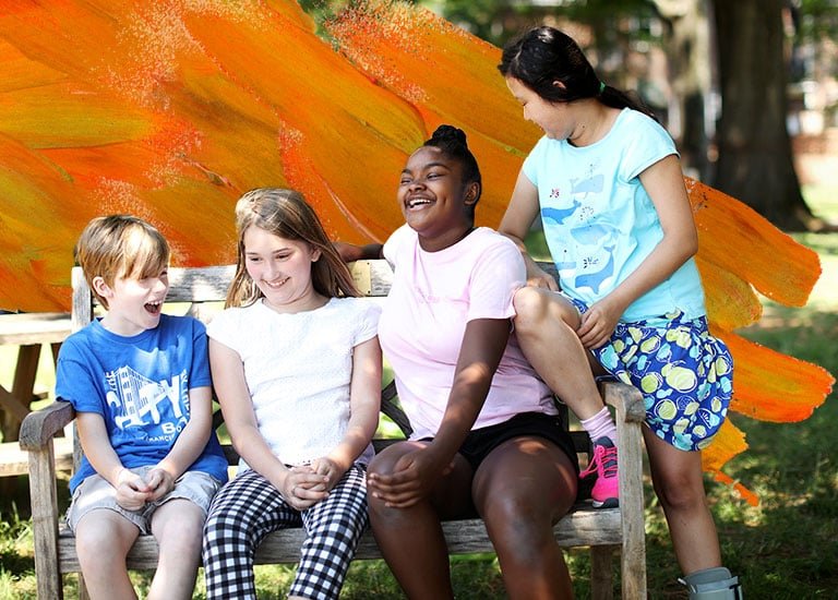 photo of children laughing together