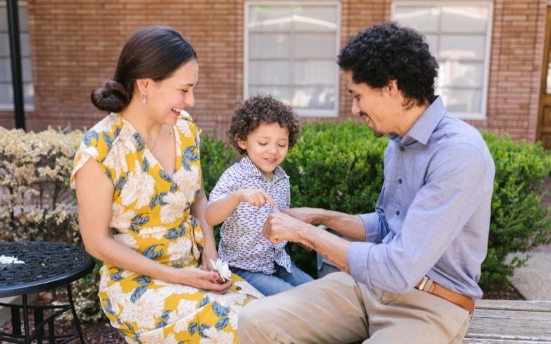 Parents playing with toddler